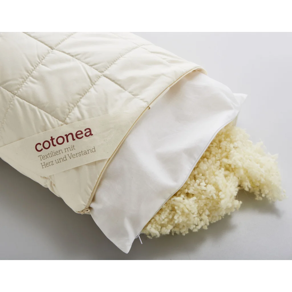 Bio Kopfkissen mit Füllung Schafschurwolle in Creme von Cotonea Größe 40x60 cm