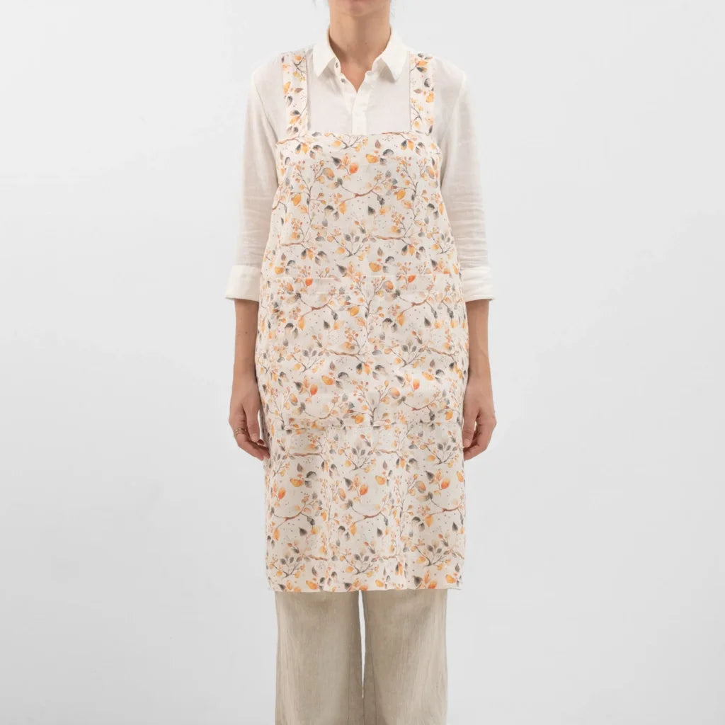 Leinen Pinafore-Schürze Blätter in Weiß+Orange+Grau Muster Blätter von Linen Tales Größe 114 cm breit+ 83 cm lang