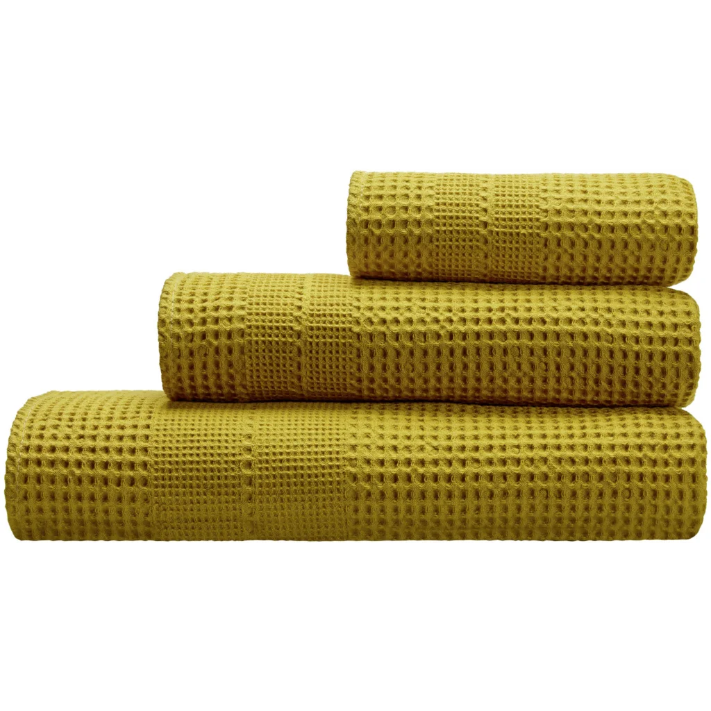 Bio Waffelpiqué Handtuch in Curry Gelb von Cotonea Größe 50x100 cm